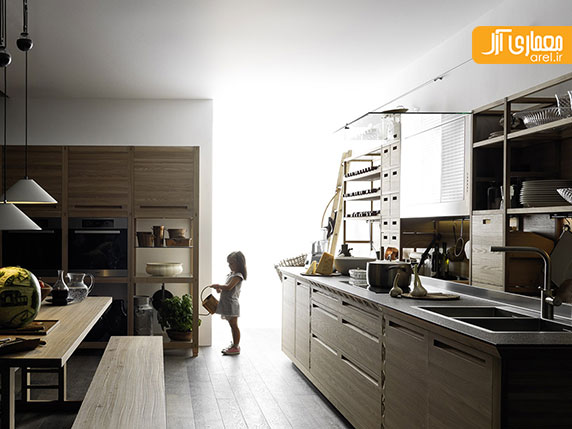 طراحی کابینت آشپزخانه ی چوبی با هنر دست و حکاکی