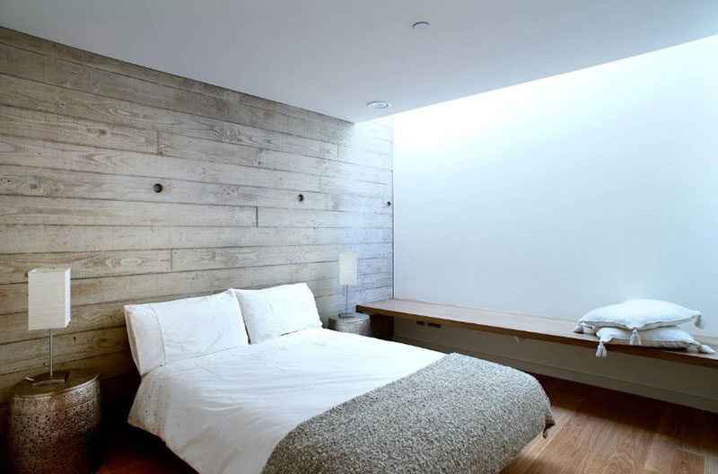 طراحی داخلی اتاق خواب با دیوار بتنی